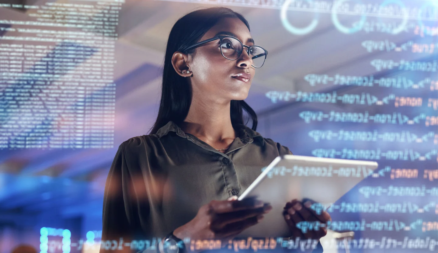 IT professional analyzing code for innovation
