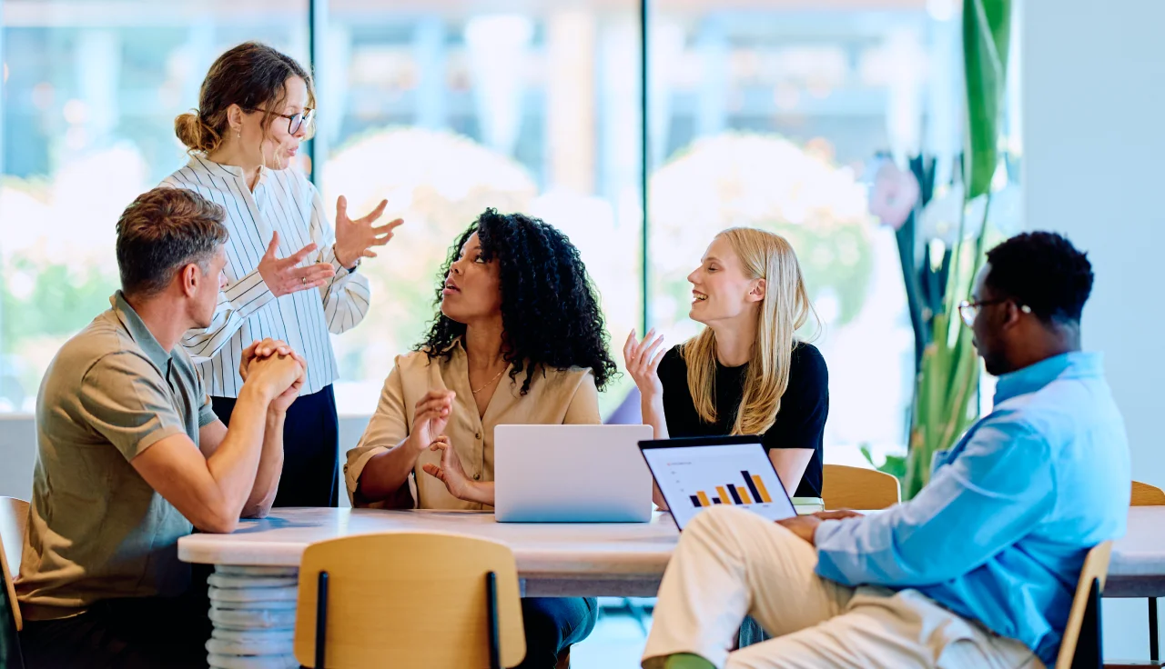 A team discussing a project during a meeting